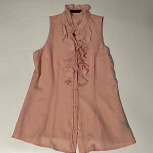 The limited blouse size medium